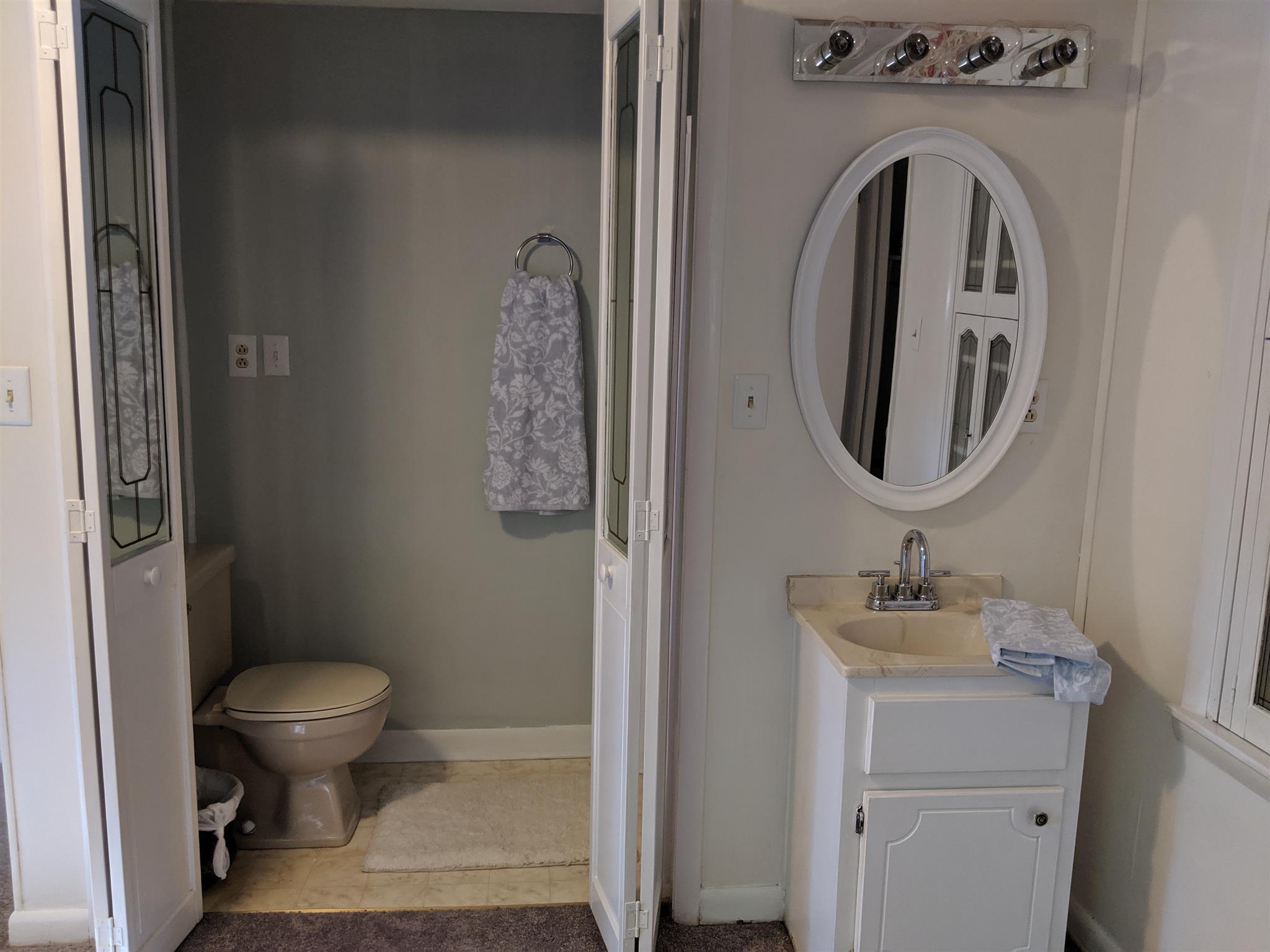 136 River Road Morrison, TN 37357 - Photo 18 of 24 Vanity in the master bedroom and the bath has a shower.