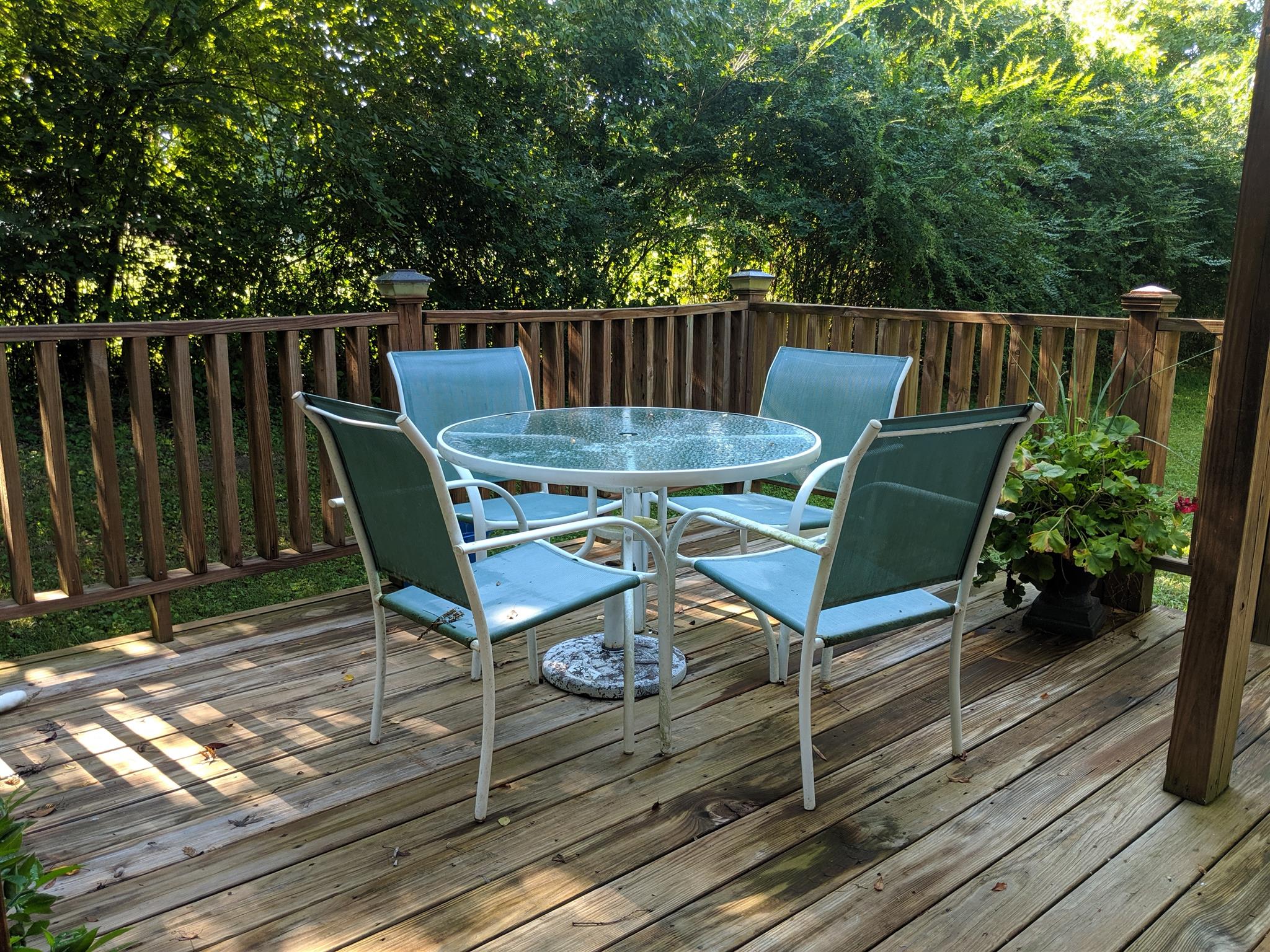 136 River Road Morrison, TN 37357 - Photo 4 of 24 Shady deck on the left side of this home. Lots of privacy.
