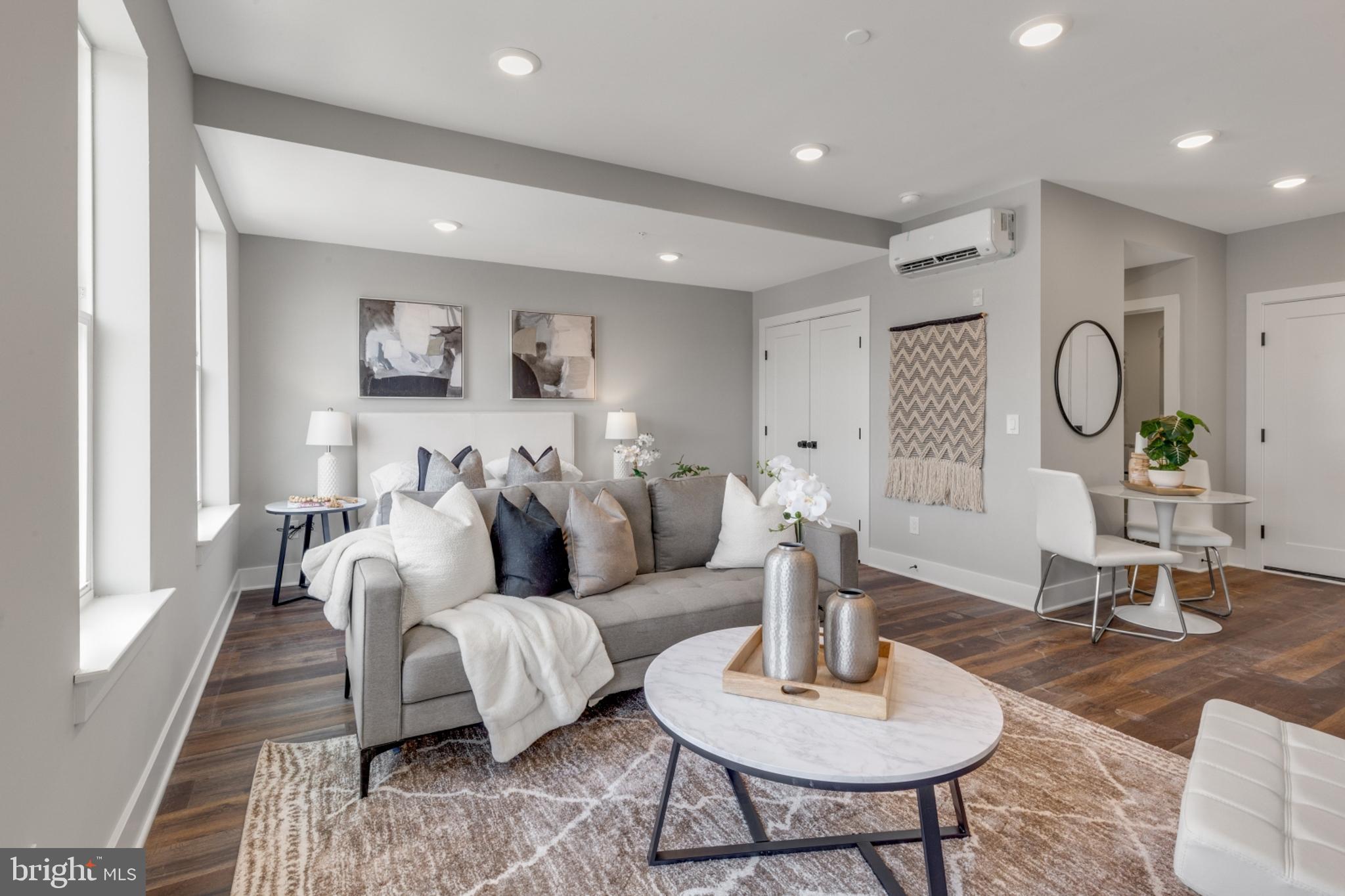 1924 North Front Street, Unit 401 Philadelphia, PA 19122 - Photo 8 of 30 a living room with furniture and a table