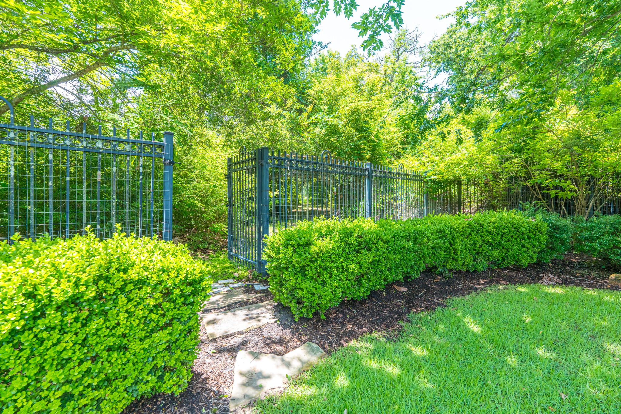 247 South Fazio Way Spring, TX 77389 - Photo 14 of 17 A private back gate provides convenient access to Carlton Woods Clubhouse, just a short walk away, blending luxury living with an exceptional lifestyle.