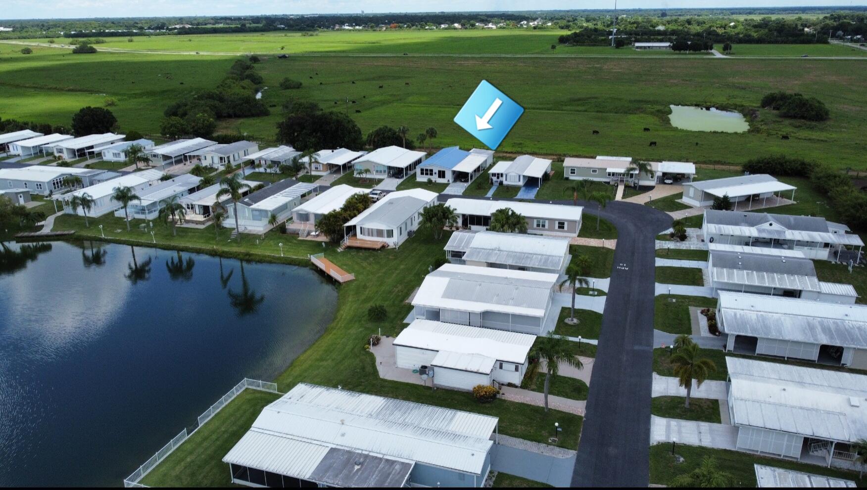 1601 Highway 441, Unit 28 Okeechobee, FL 34974 - Photo 31 of 35 a view of a lake with outdoor space