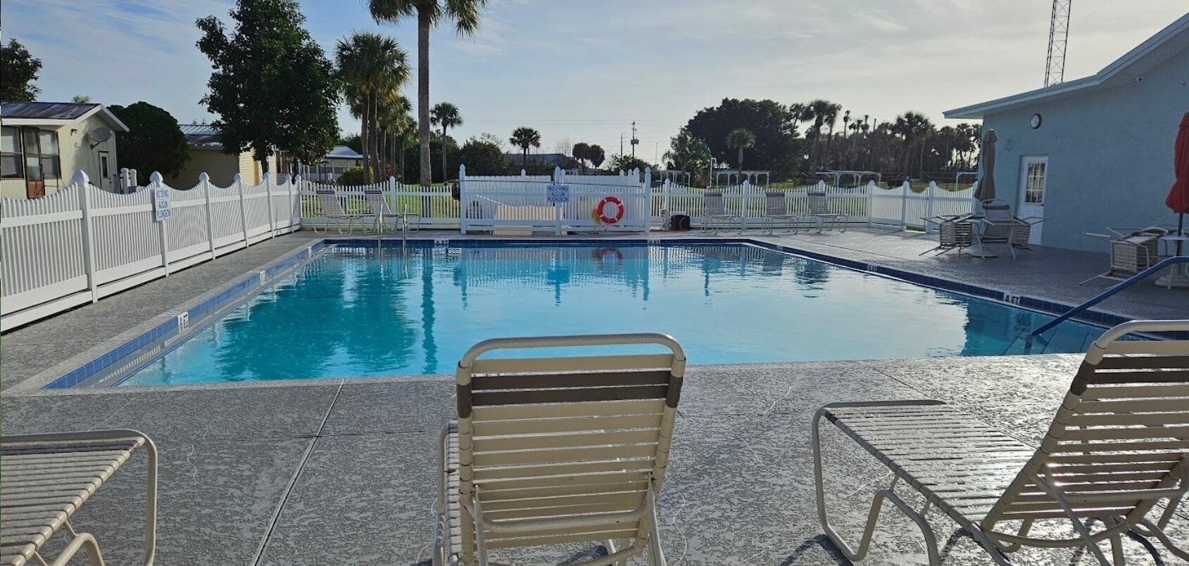 1601 Highway 441, Unit 28 Okeechobee, FL 34974 - Photo 35 of 35 a view of a balcony with chairs