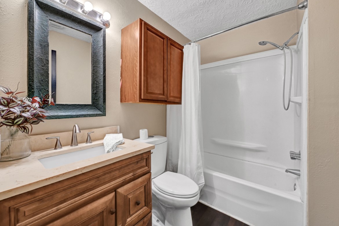 3403 Dryburgh Court Huffman, TX 77336 - Photo 12 of 18 a bathroom with a sink toilet and shower