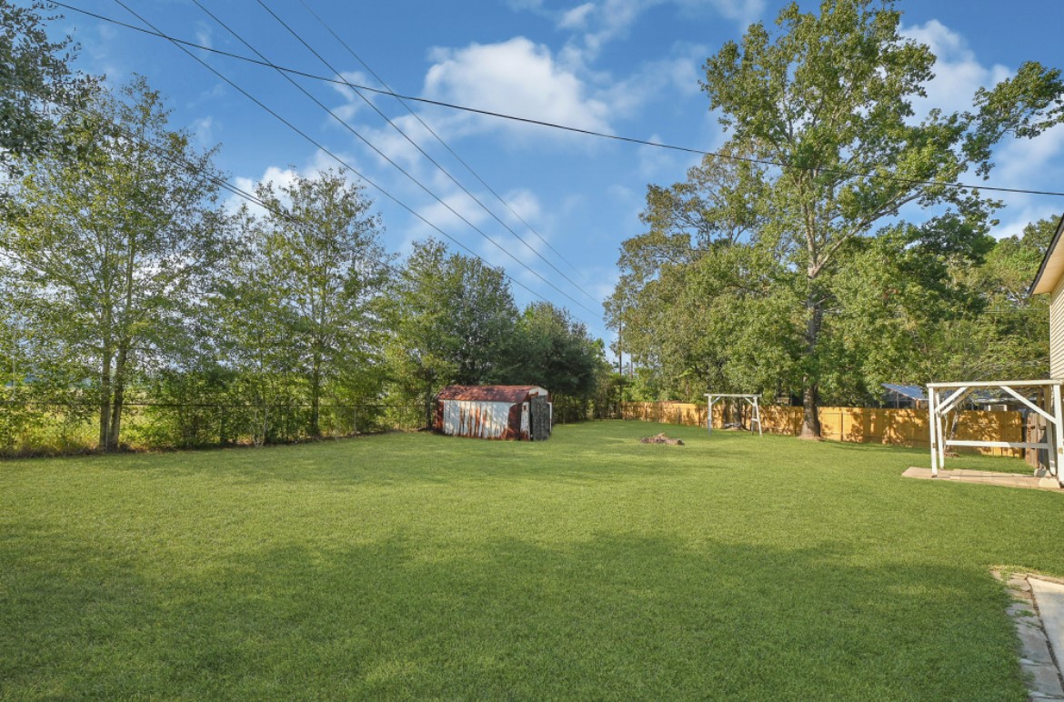 3403 Dryburgh Court Huffman, TX 77336 - Photo 16 of 18 a view of a park with large trees