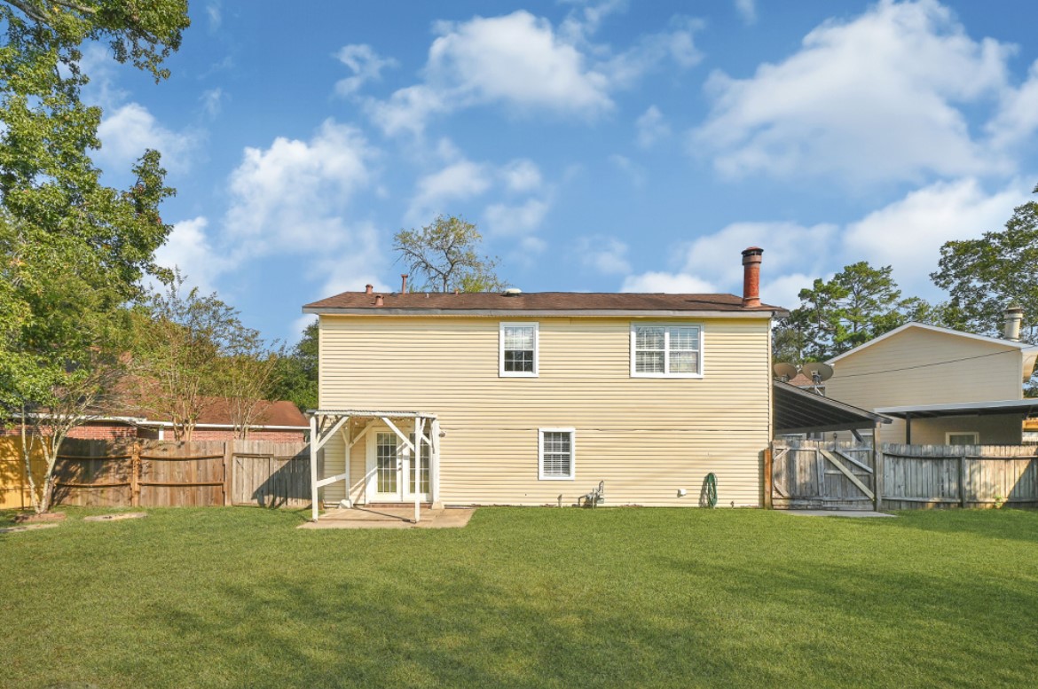 3403 Dryburgh Court Huffman, TX 77336 - Photo 18 of 18 a view of a backyard of the house