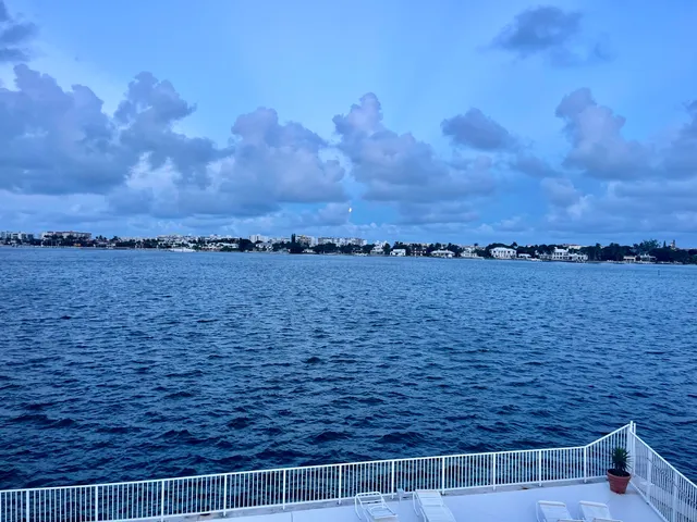 a view of a terrace next to a yard