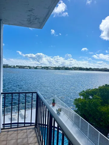 a view of a balcony with an ocean view