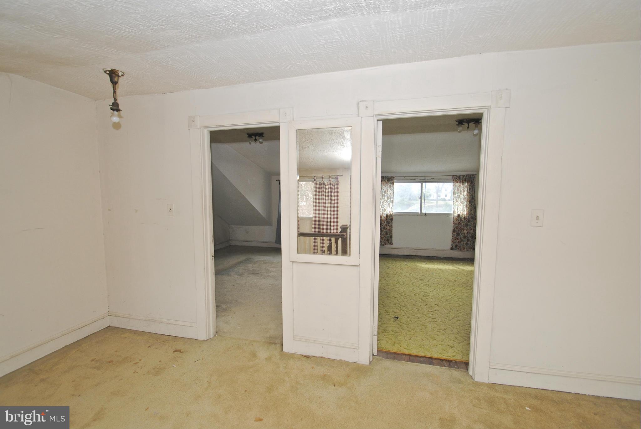 717 Red Cedar Road Annapolis, MD 21409 - Photo 17 of 30 a view of a kitchen cabinets and a refrigerator
