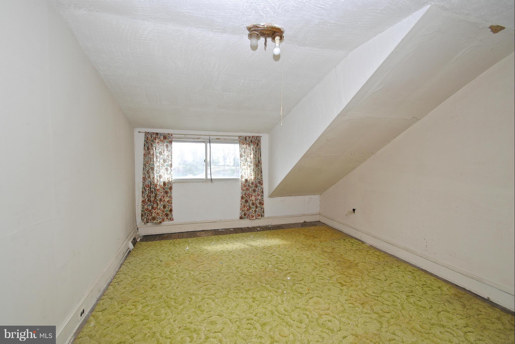 717 Red Cedar Road Annapolis, MD 21409 - Photo 18 of 30 a view of an empty room with a window