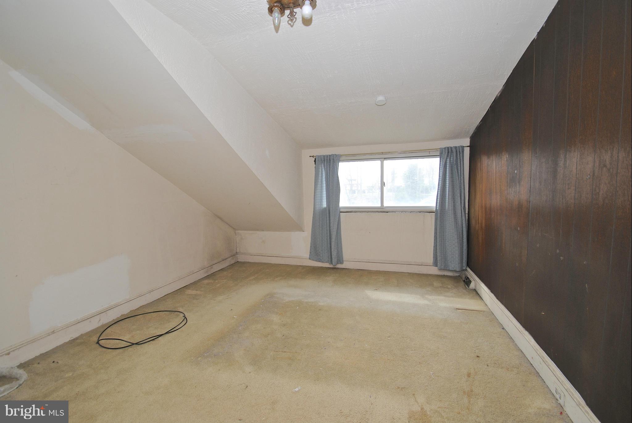 717 Red Cedar Road Annapolis, MD 21409 - Photo 19 of 30 an empty room with a window