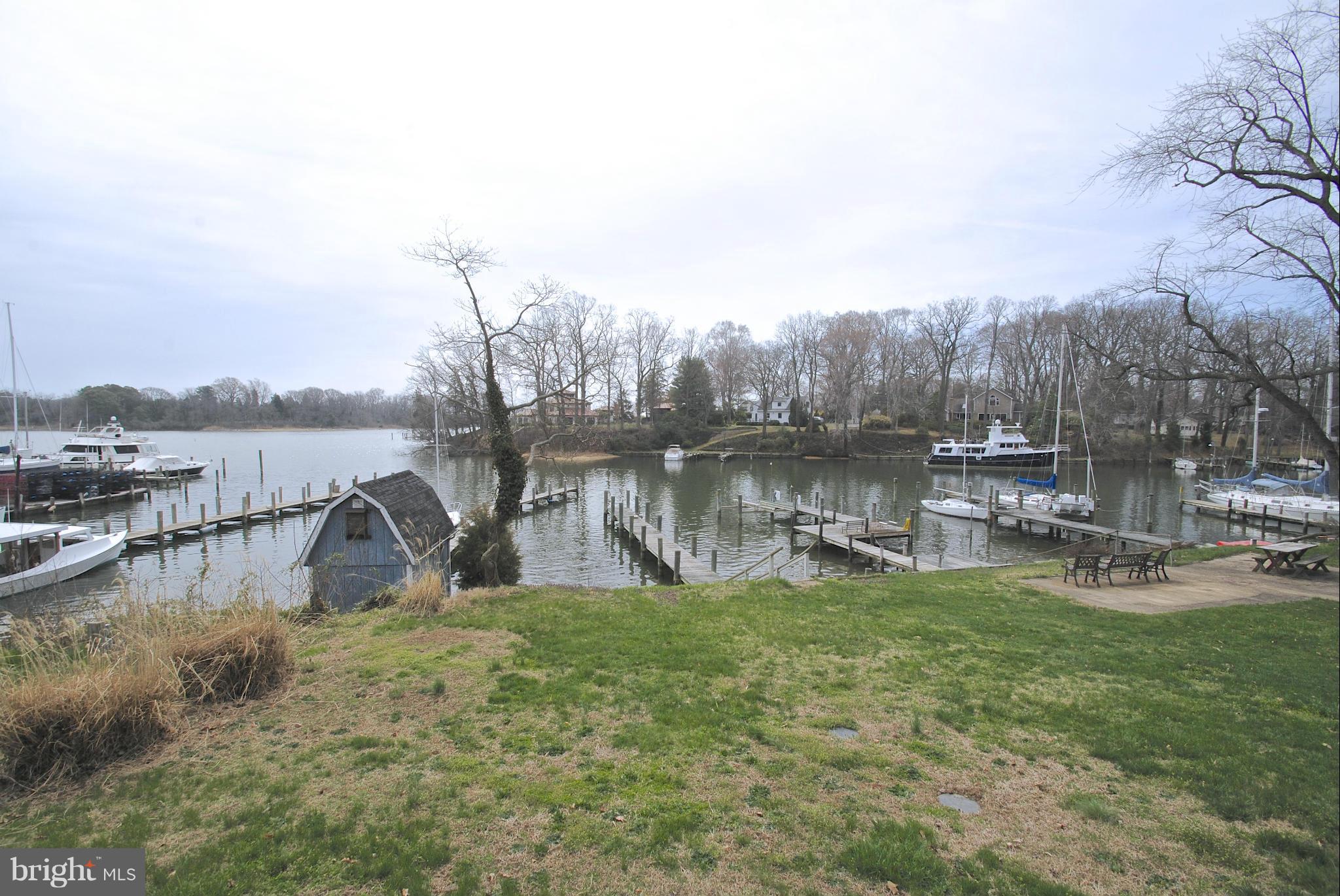 717 Red Cedar Road Annapolis, MD 21409 - Photo 23 of 30 a view of a lake with houses with outdoor space