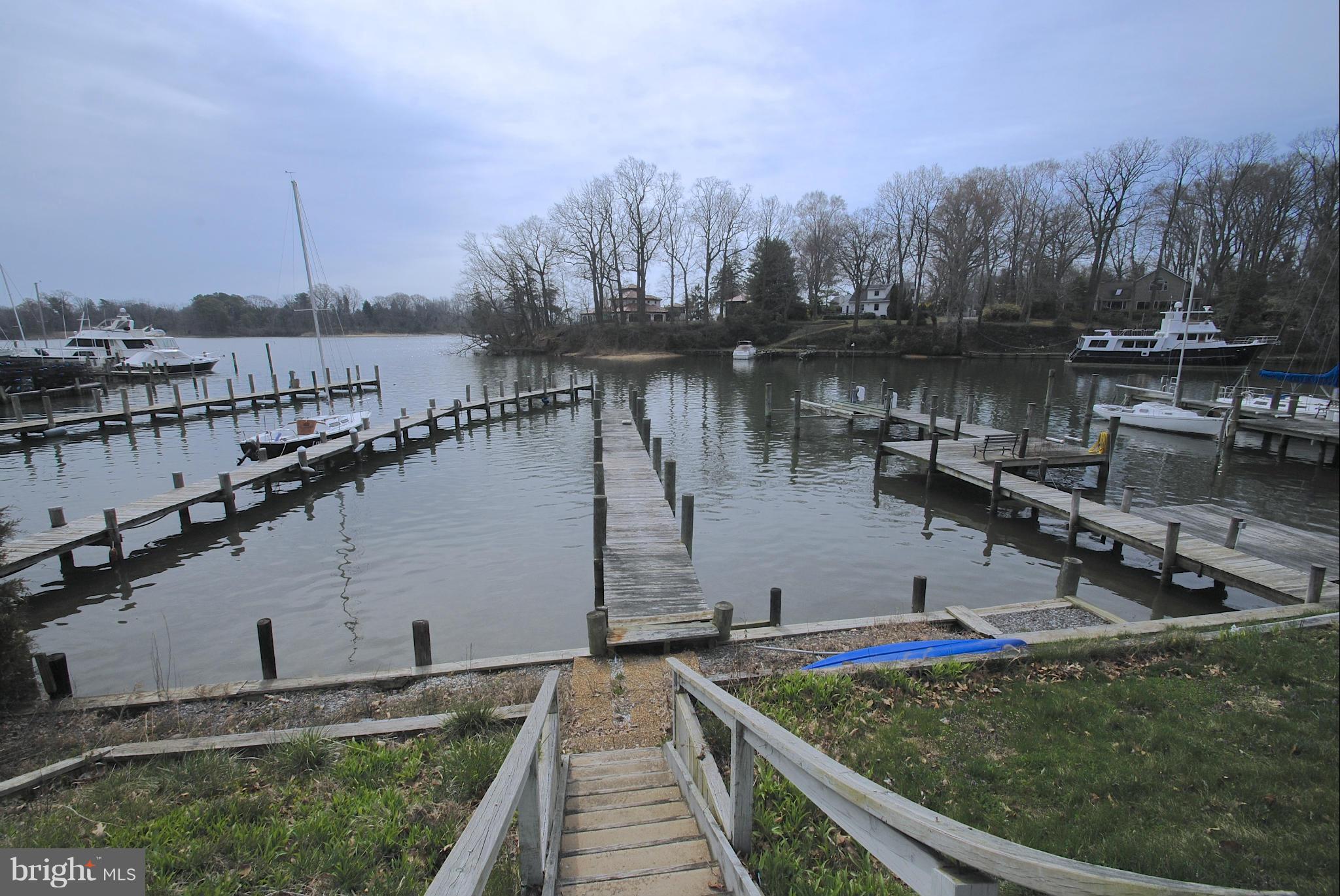 717 Red Cedar Road Annapolis, MD 21409 - Photo 4 of 30 a view of a lake with a large bridge