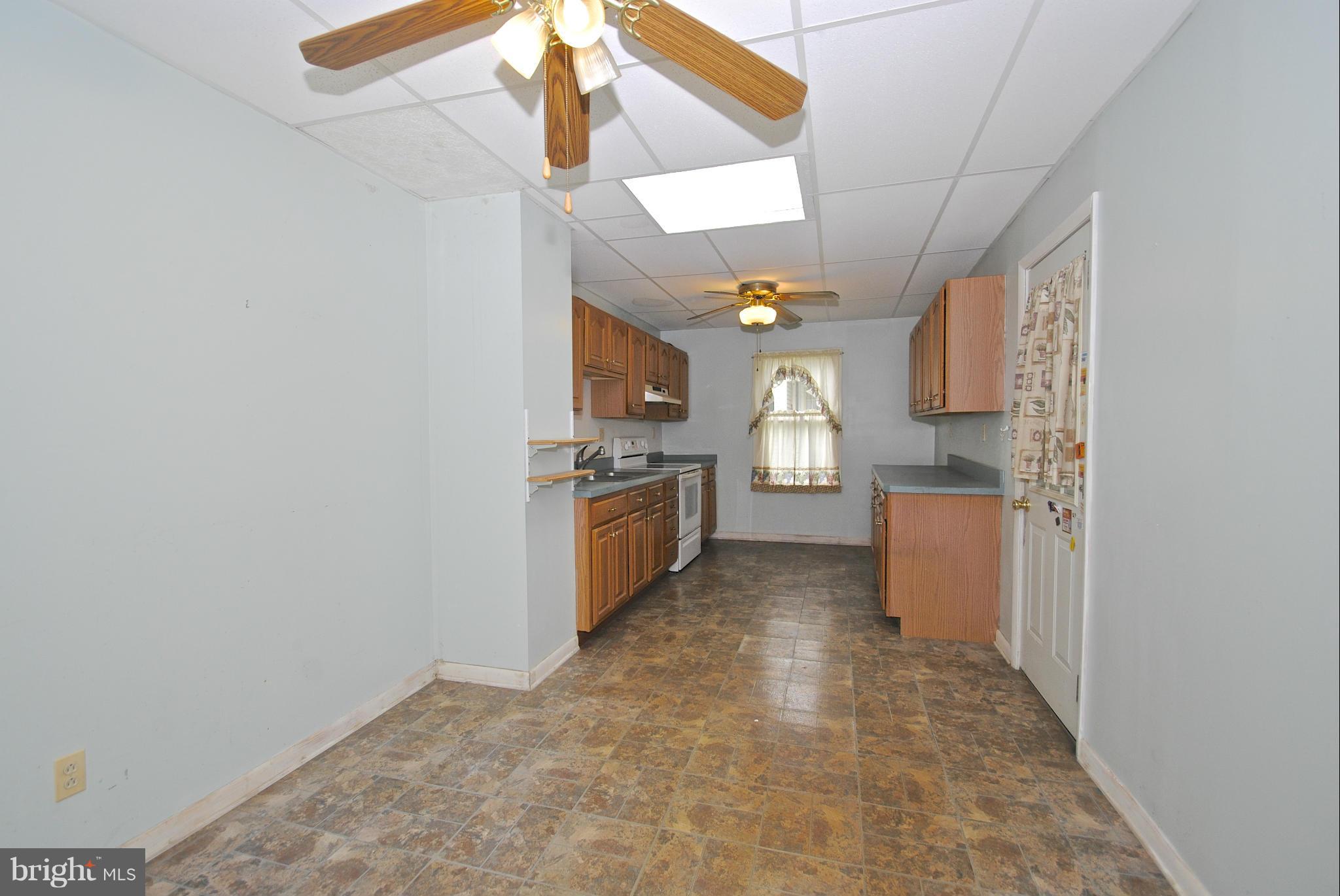 717 Red Cedar Road Annapolis, MD 21409 - Photo 9 of 30 a view of a kitchen with a sink
