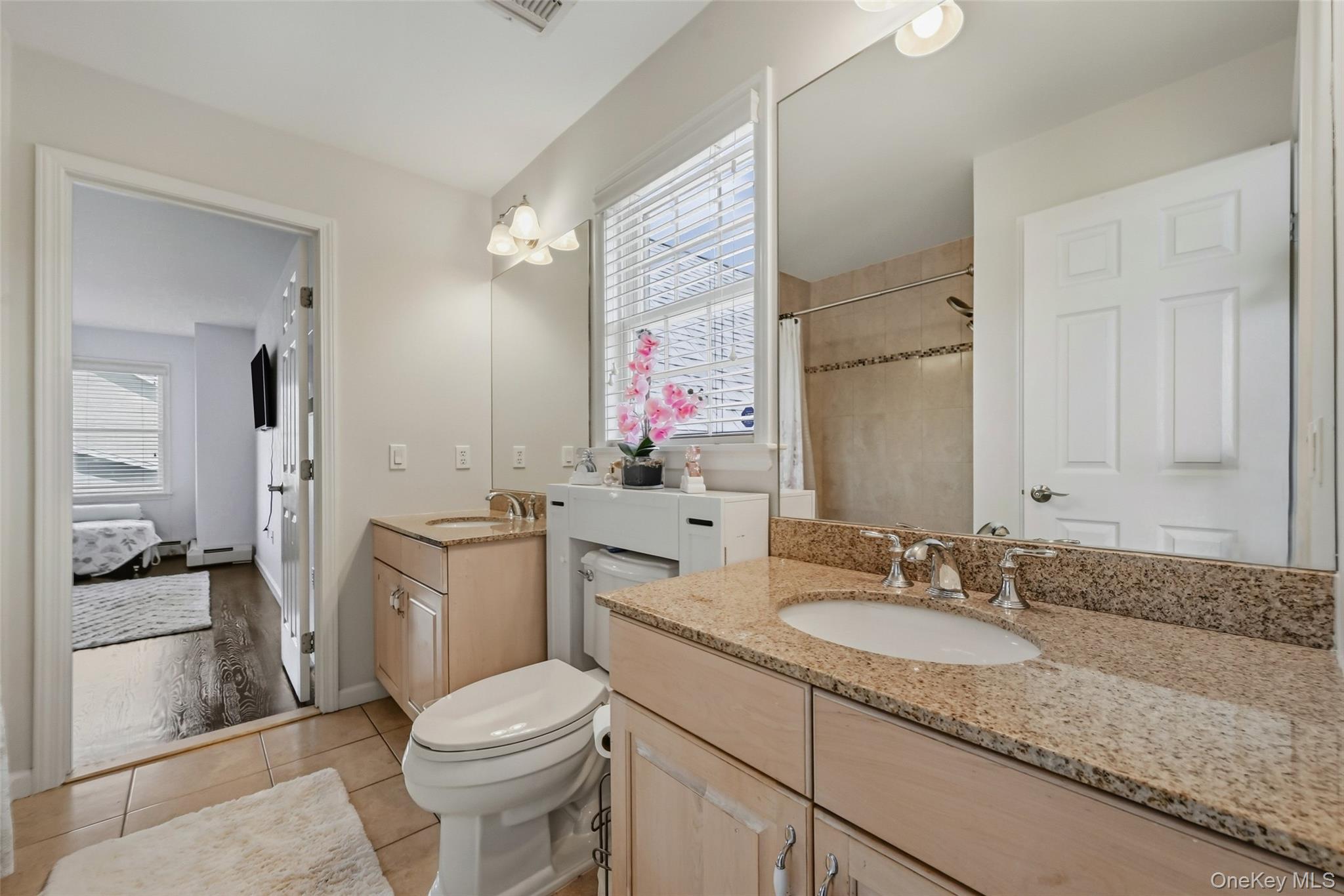 51 Meriwether Trail Congers, NY 10920 - Photo 29 of 50 Jack and Jill Bathroom featuring dual vanity with light-toned wood cabinetry and undermount sinks
