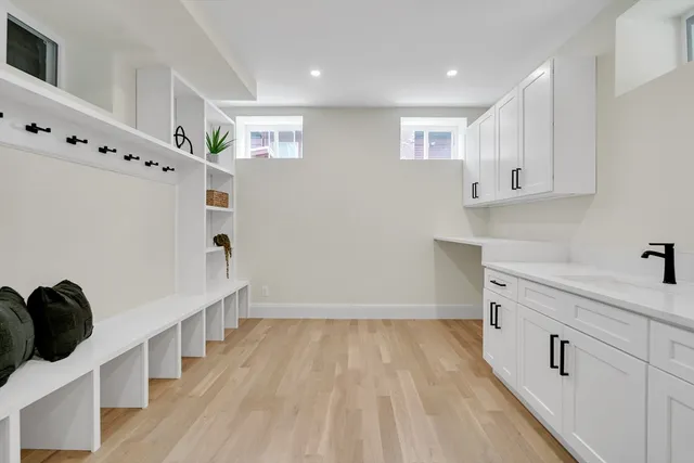 a view of kitchen with furniture and wooden floor