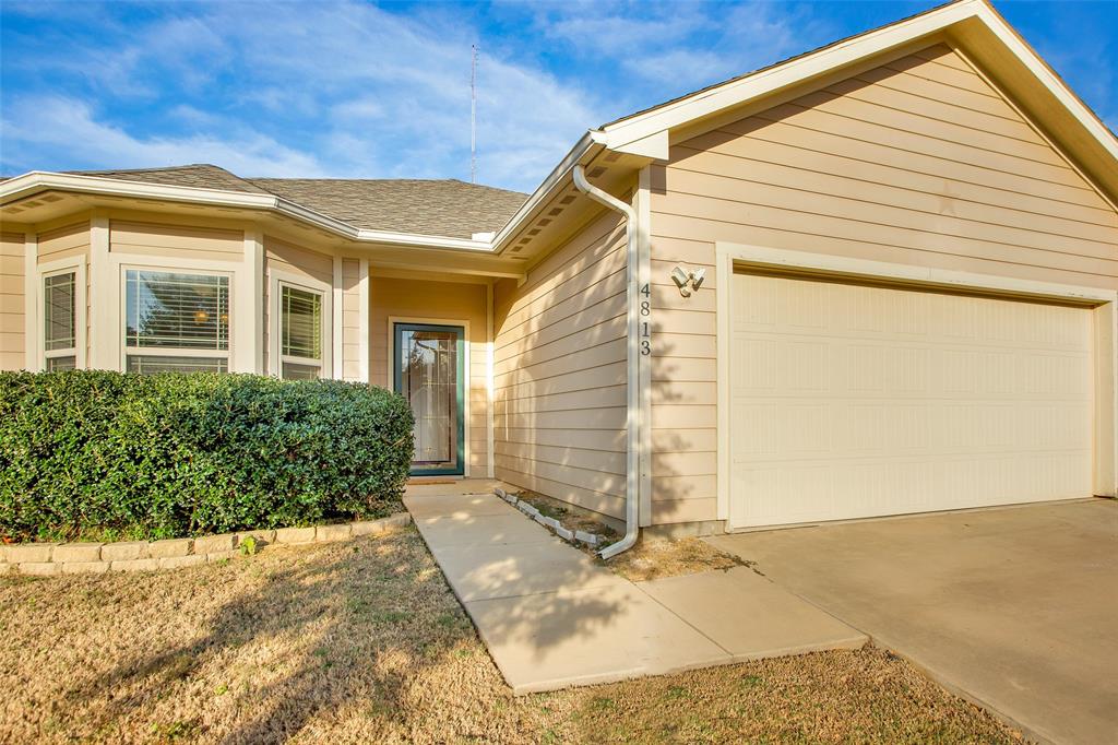 4813 Pinnacle Place Denison, TX 75021 - Photo 3 of 28 a view of a house with a backyard