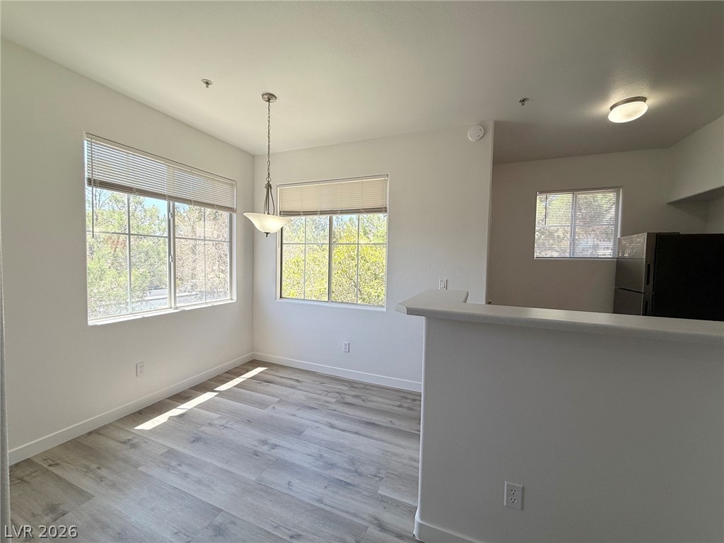 9050 West Warm Springs Road, Unit 2002 Las Vegas, NV 89148 - Photo 13 of 46 This bright space features ample natural light and durable flooring, perfect for versatile living.