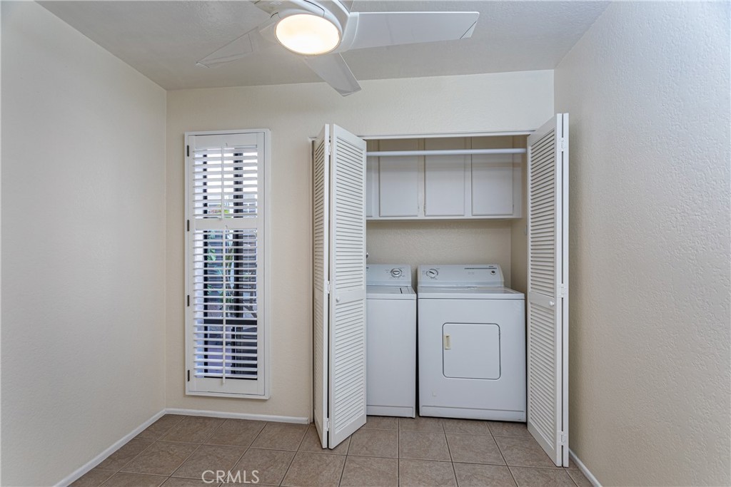 230 Bethany Road, Unit 306 Burbank, CA 91504 - Photo 17 of 44 a room with a bench and dryer