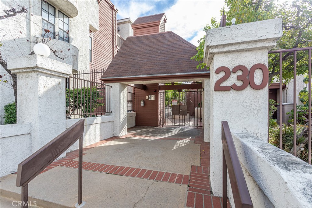 230 Bethany Road, Unit 306 Burbank, CA 91504 - Photo 2 of 44 a front view of a house with garden