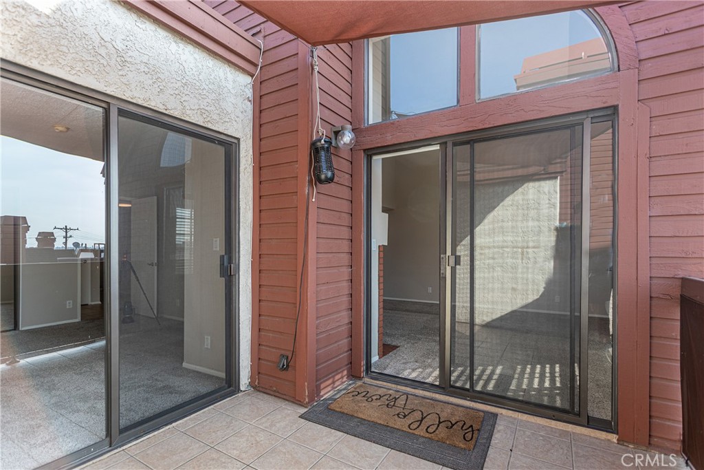 230 Bethany Road, Unit 306 Burbank, CA 91504 - Photo 21 of 44 a view of a glass door with a glass door