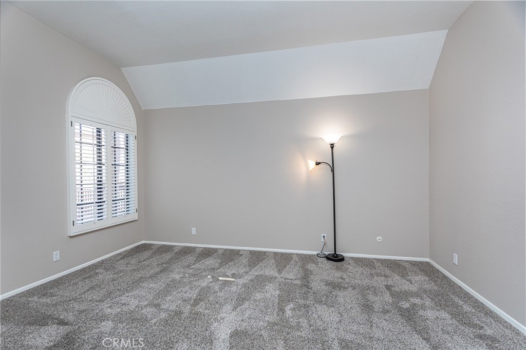 230 Bethany Road, Unit 306 Burbank, CA 91504 - Photo 24 of 44 an empty room with windows and closet