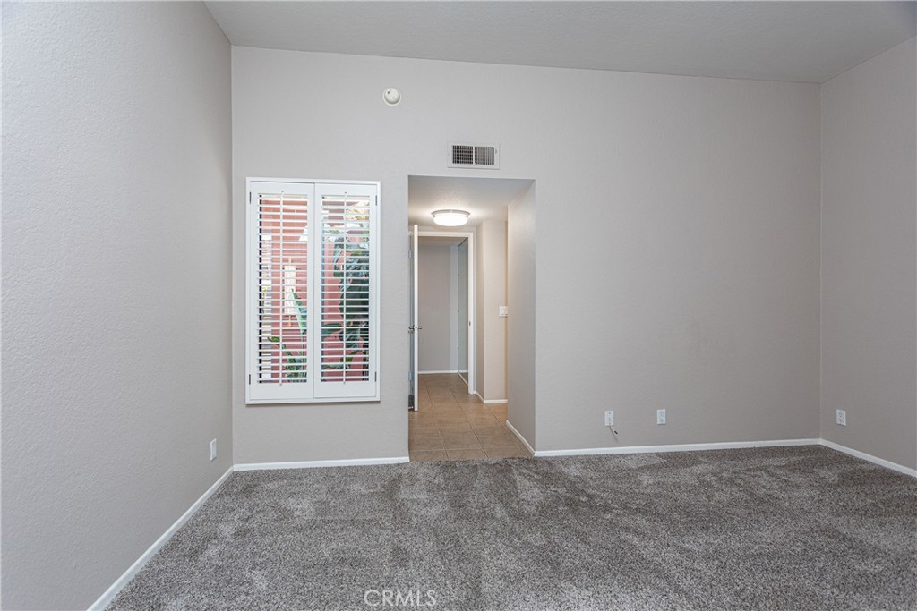230 Bethany Road, Unit 306 Burbank, CA 91504 - Photo 26 of 44 a view of an empty room with a window
