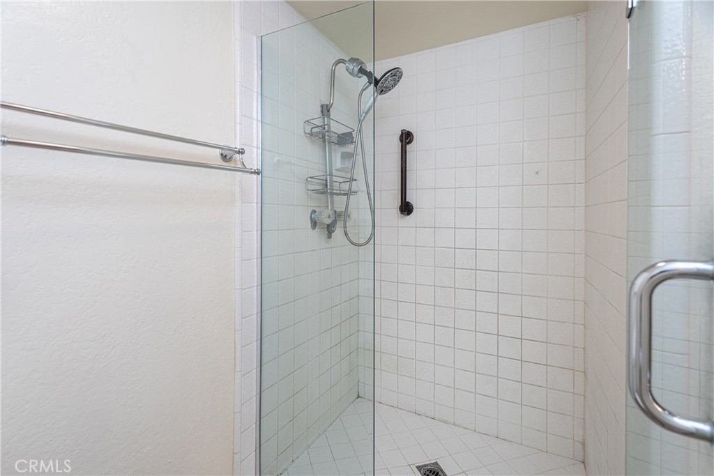 230 Bethany Road, Unit 306 Burbank, CA 91504 - Photo 29 of 44 a bathroom with a shower