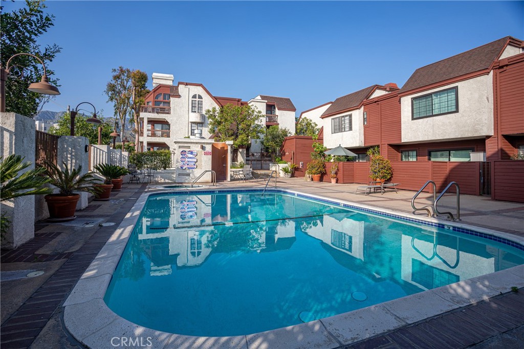 230 Bethany Road, Unit 306 Burbank, CA 91504 - Photo 33 of 44 a view of a house with swimming pool