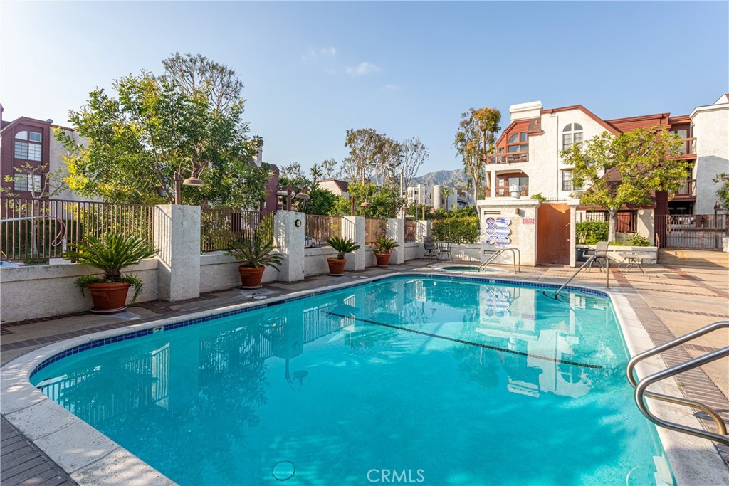 230 Bethany Road, Unit 306 Burbank, CA 91504 - Photo 34 of 44 a view of a house with a swimming pool