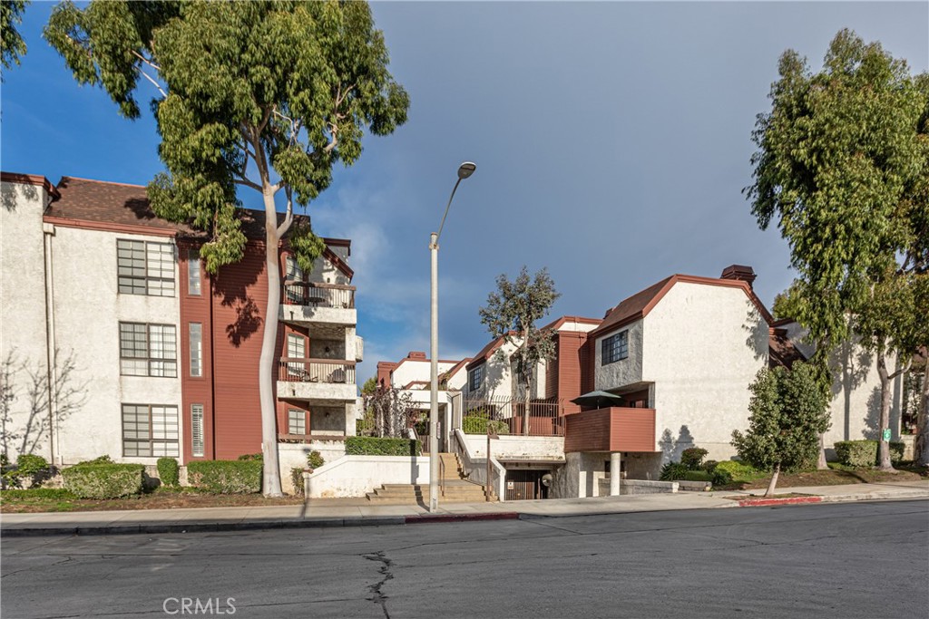 230 Bethany Road, Unit 306 Burbank, CA 91504 - Photo 44 of 44 front view of a building with a street