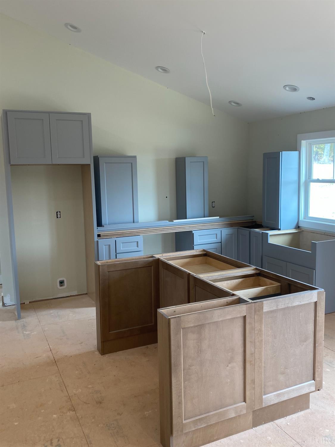 1078 Quaker Church Road Bedford, VA 24523 - Photo 11 of 20 a kitchen that has a sink and a stove in it