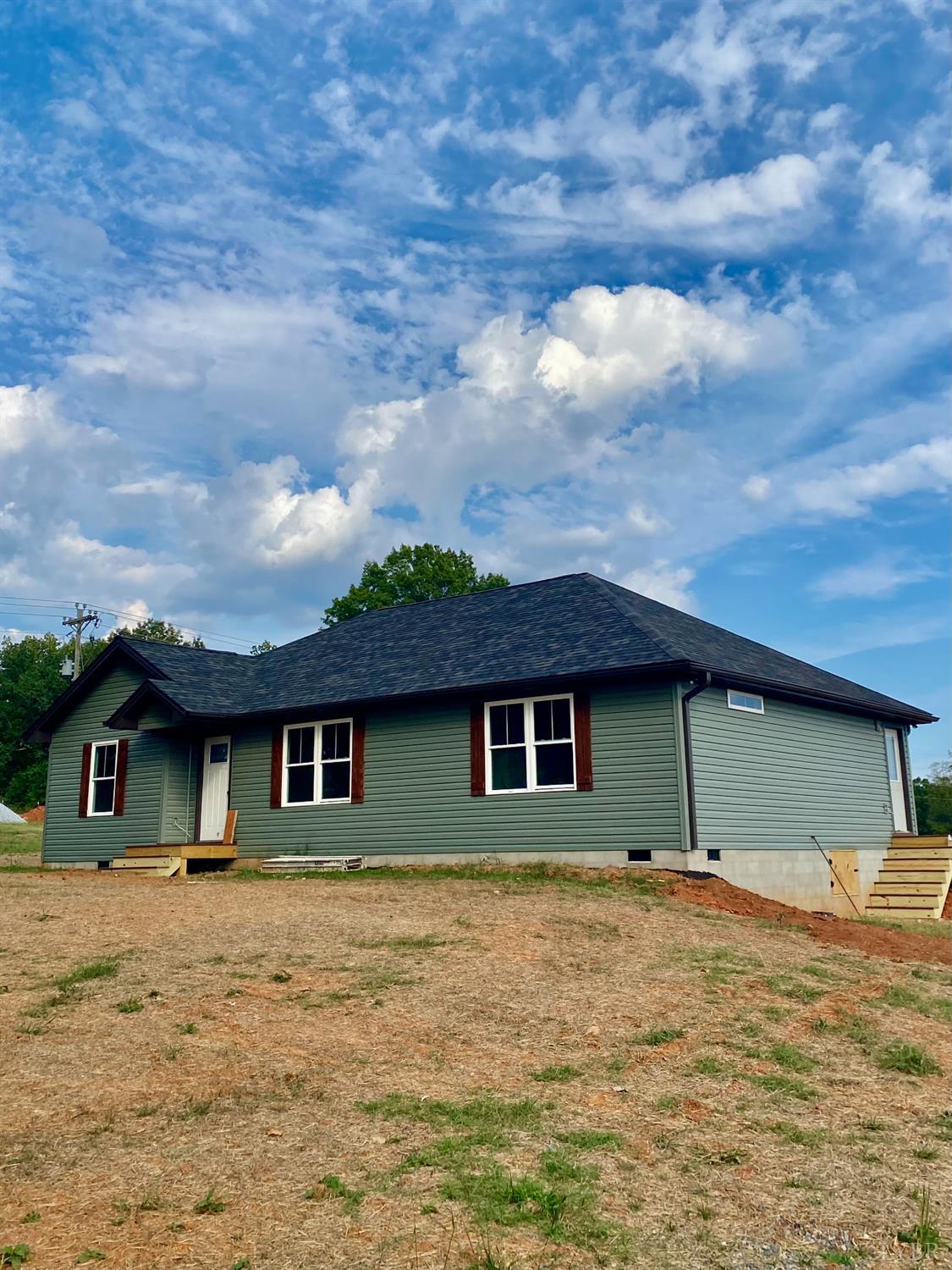1078 Quaker Church Road Bedford, VA 24523 - Photo 2 of 20 a view of a house with a backyard