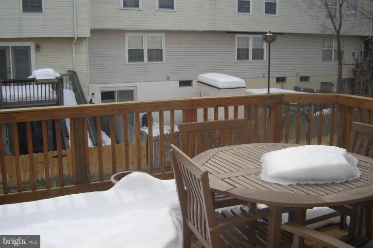 17563 Kohlhoss Road Poolesville, MD 20837 - Photo 17 of 20 a view of balcony and wooden floor