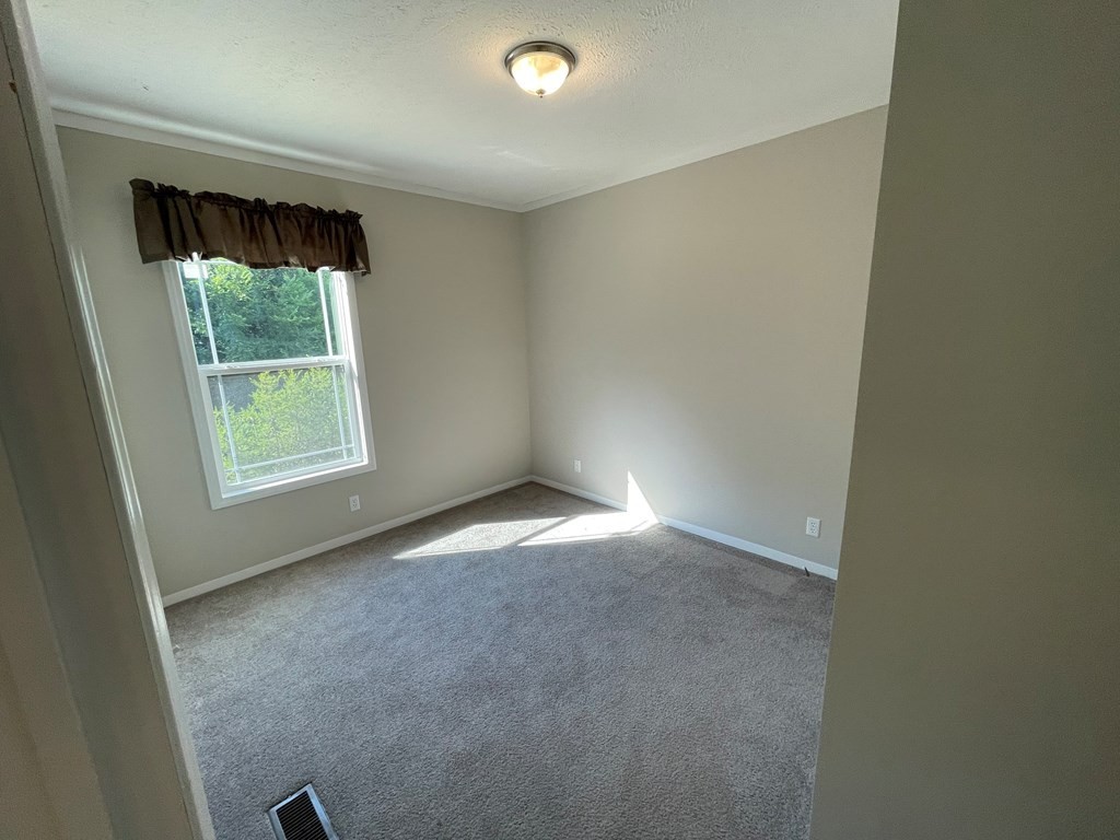 1348 Bluets Road Newport, TN 37821 - Photo 25 of 47 an empty room with a window