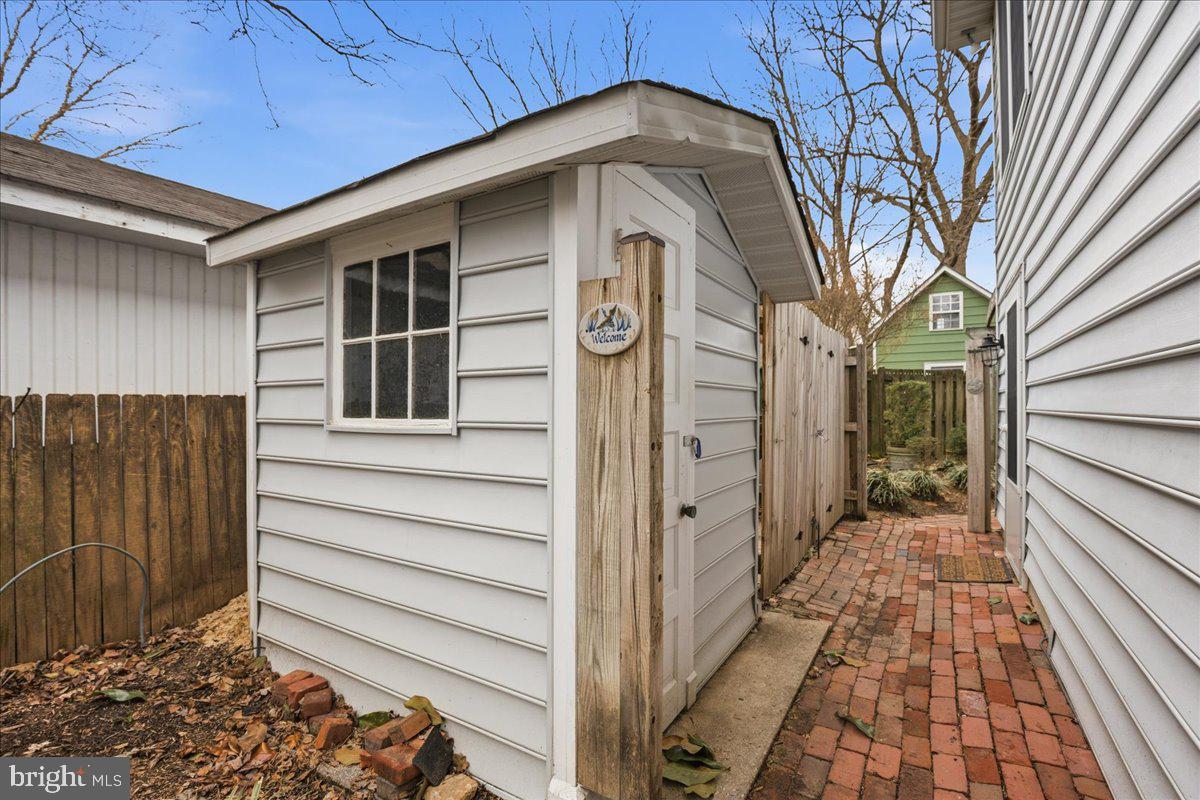 14382 Sedwick Avenue Solomons, MD 20688 - Photo 66 of 90 Shed and storage behind fencing