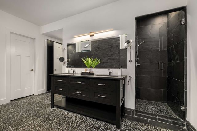 a view of a hallway with a livingroom with furniture