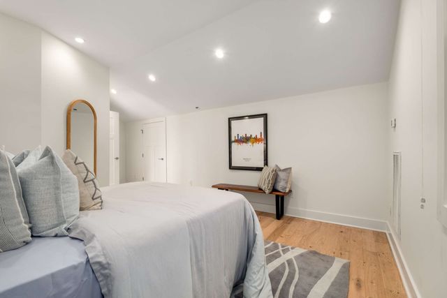 a view of a wooden chairs in patio of the house