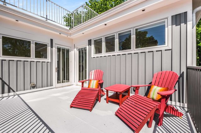 a view of a chair and tables