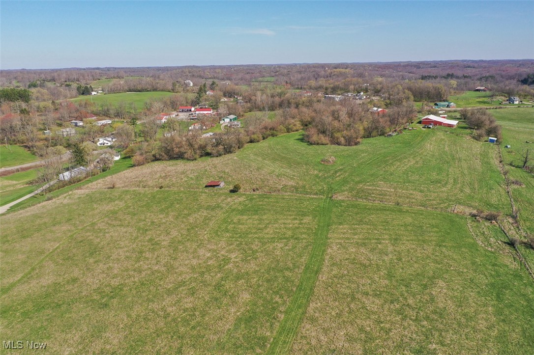 45559 Old Hopedale Road Cadiz, OH 43907 - Photo 2 of 26 Aerial view of property and surrounding area with rural landscape