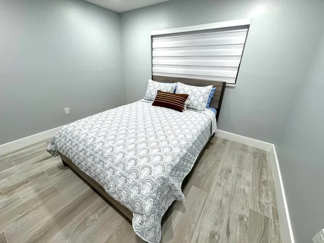 a view of balcony with furniture