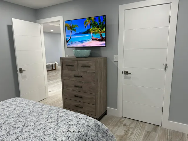 a front view of a house with yard and porch