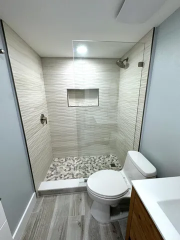 a view of a dining room with furniture and window