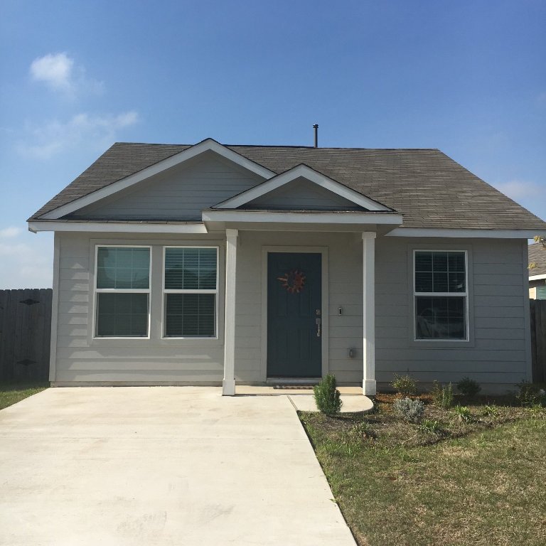 13801 Mussel Run Elgin, TX 78621 - Photo 1 of 18 a front view of a house