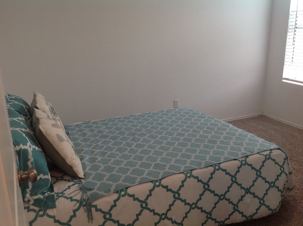 13801 Mussel Run Elgin, TX 78621 - Photo 11 of 18 a view of a bedroom