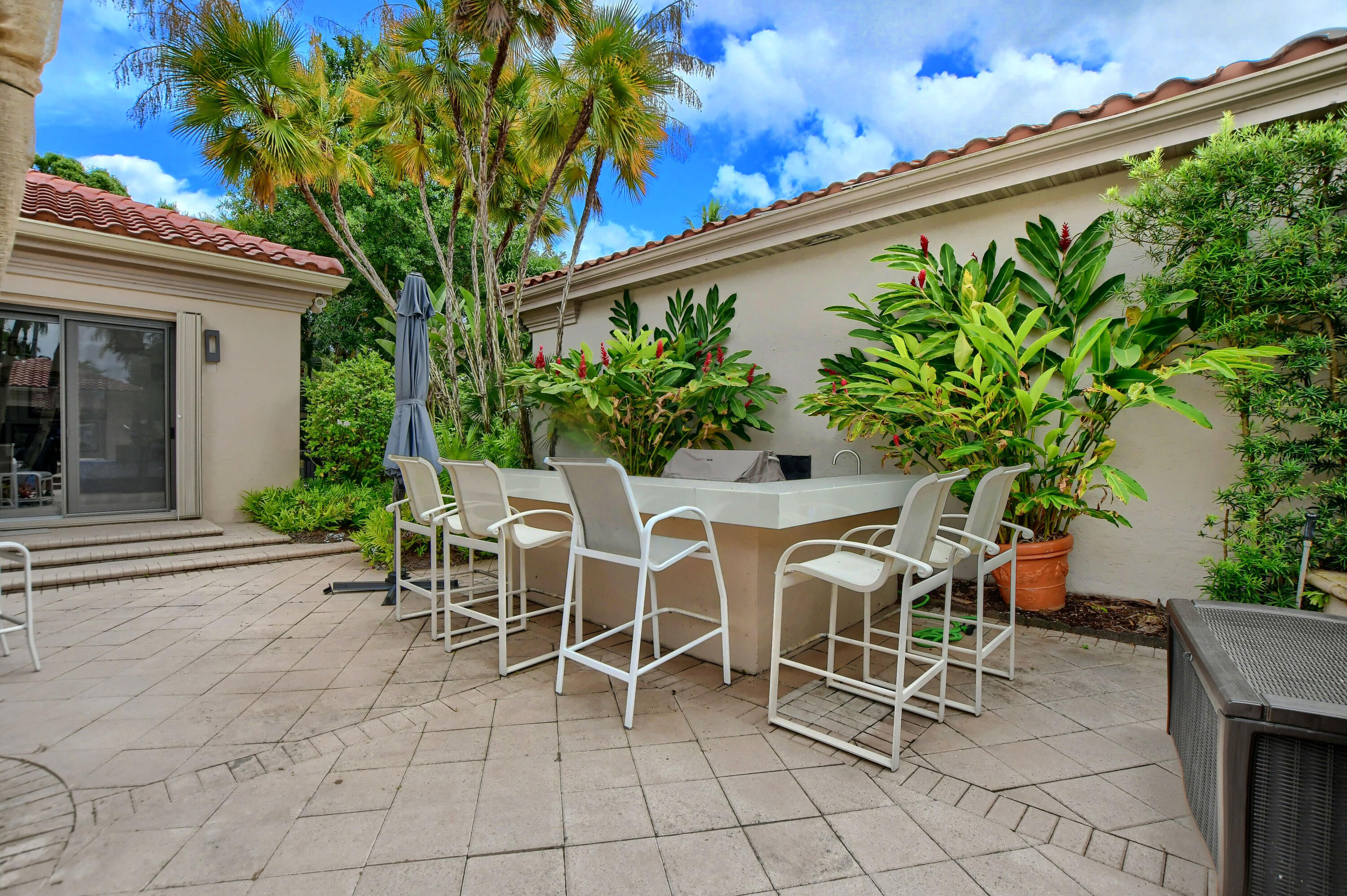 5894 Northwest 25th Court Boca Raton, FL 33496 - Photo 44 of 46 summer kitchen