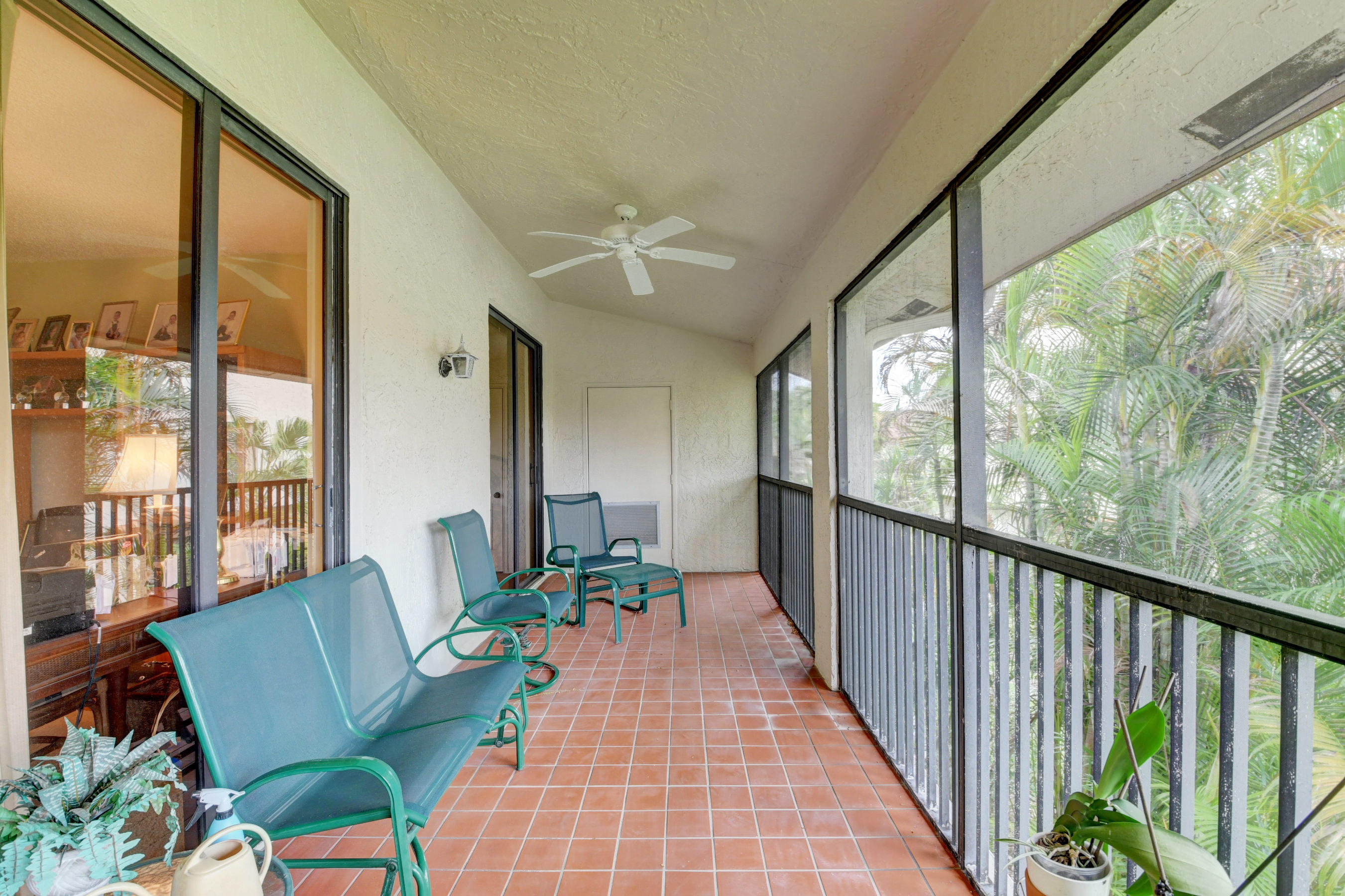 7861 La Mirada Drive Boca Raton, FL 33433 - Photo 12 of 26 a living room with furniture and a large window
