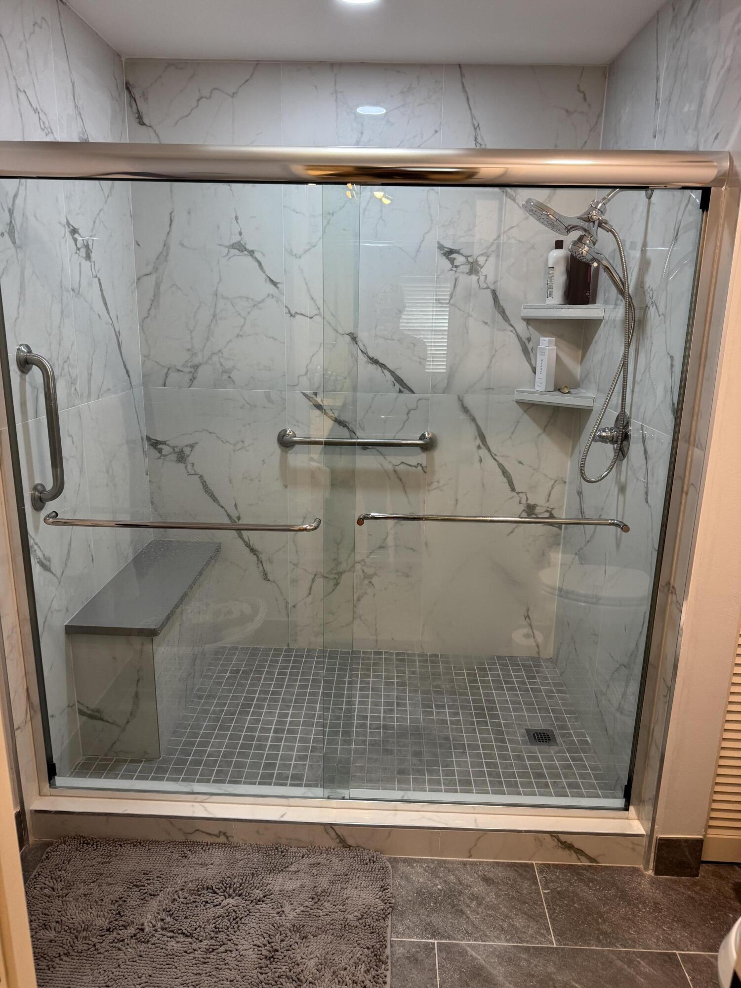 7861 La Mirada Drive Boca Raton, FL 33433 - Photo 22 of 26 a bathroom with a shower