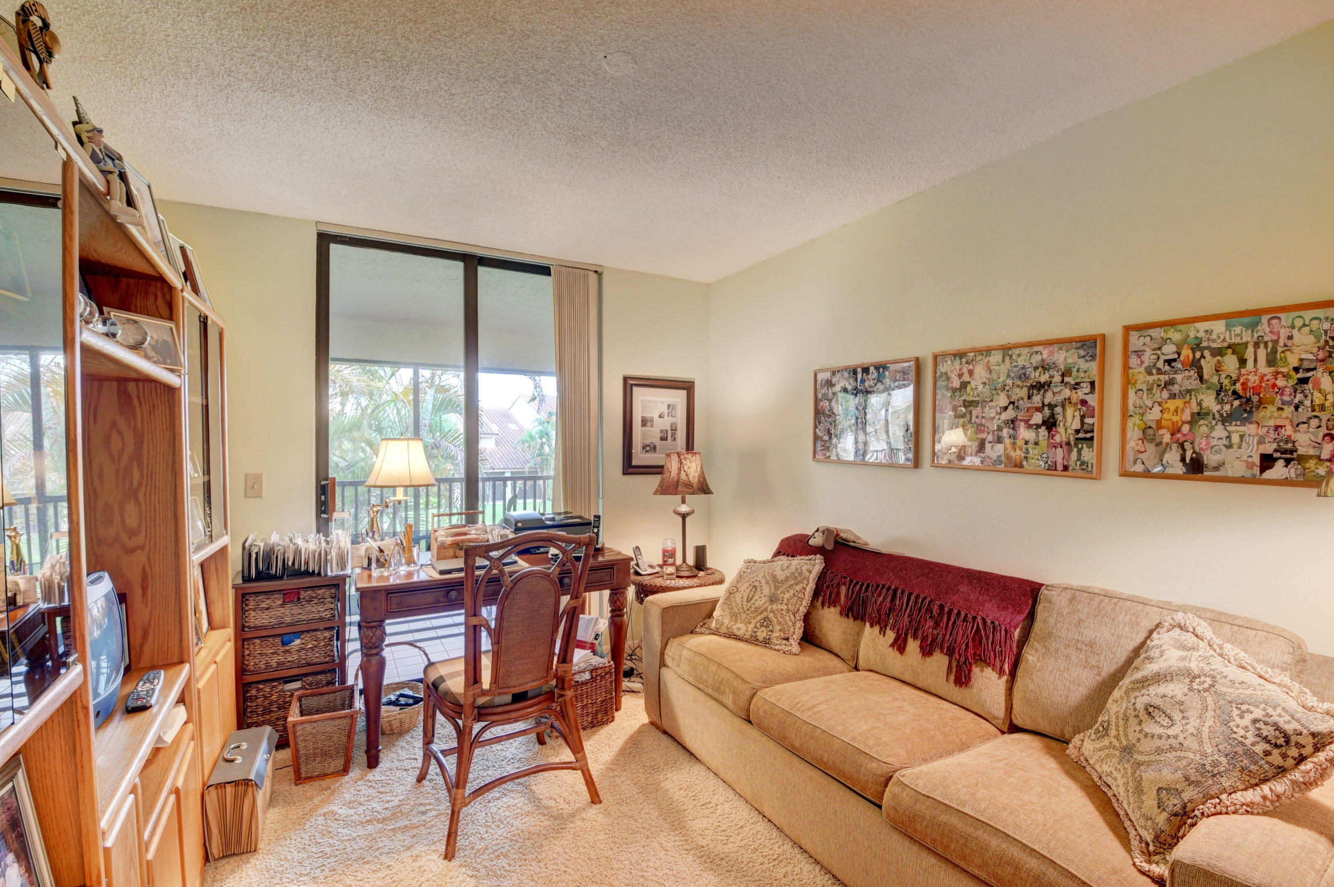 7861 La Mirada Drive Boca Raton, FL 33433 - Photo 23 of 26 a living room with furniture and large windows