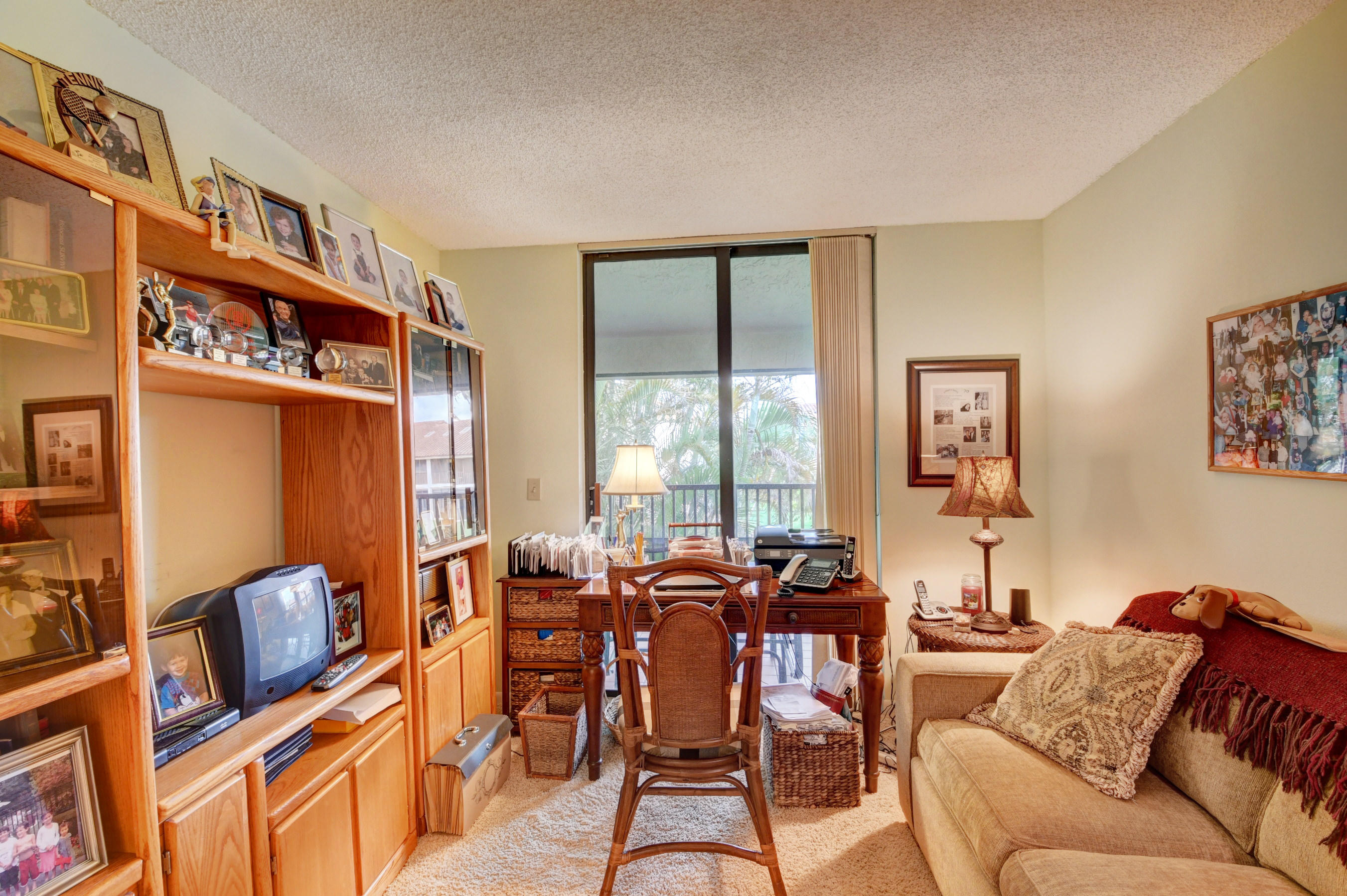 7861 La Mirada Drive Boca Raton, FL 33433 - Photo 24 of 26 a view of a livingroom with furniture window and outside view