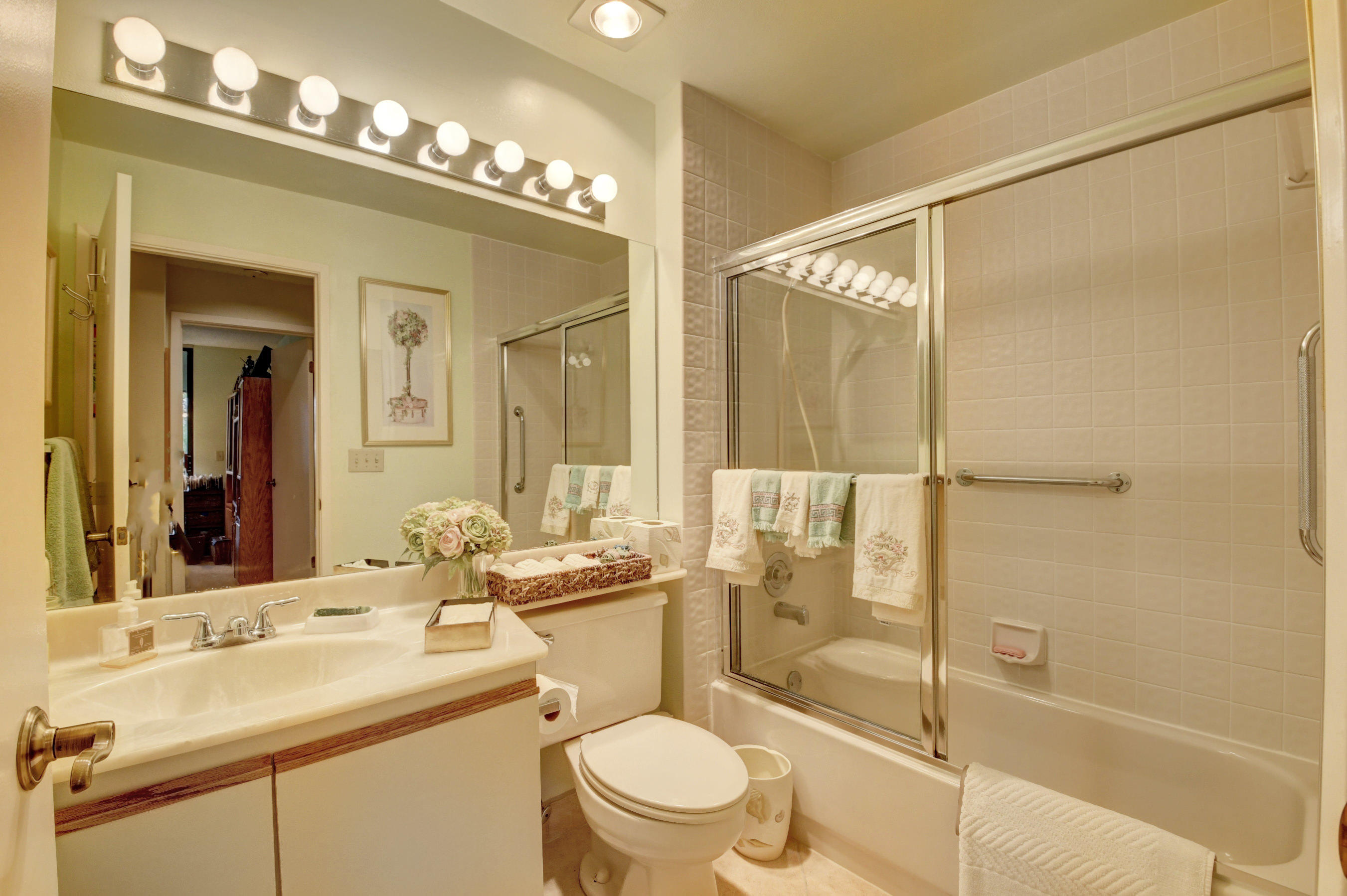 7861 La Mirada Drive Boca Raton, FL 33433 - Photo 26 of 26 a bathroom with a sink a toilet and shower